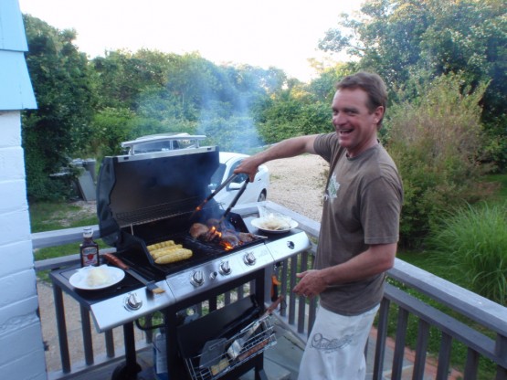 Tim throwing everything on the barbecue he could find