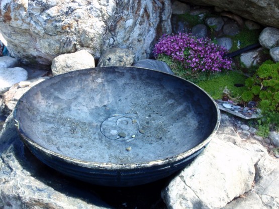 The magic bowl of harmony filled with water from the hot springs