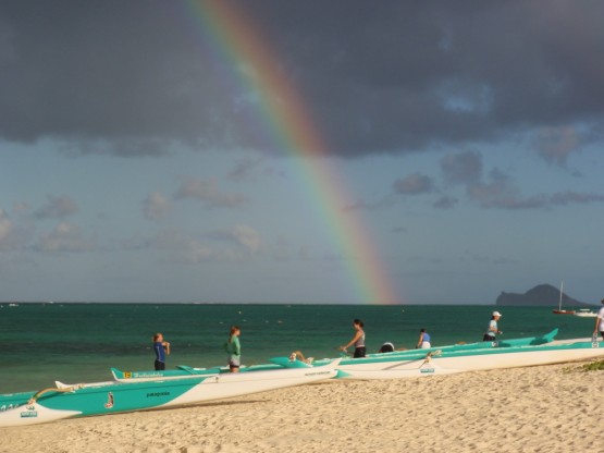 This is why they call it the rainbow state - 6 people outrigger canoes launching for their evening session: dozens of boats go out for practice every evening, on the weekend they have races