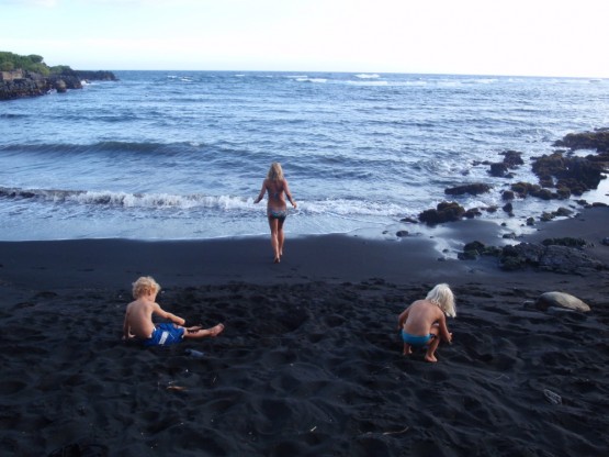 Washing off the black sand