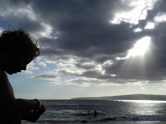 late breakthrough of the sun at Wailea's Big Beach on the Southwest coast