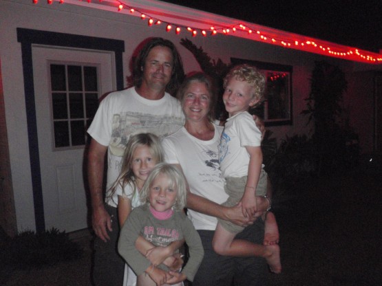 marian Last smiles from Charlie Marian Siena with Sienna and Robinson in front of their Kailua house