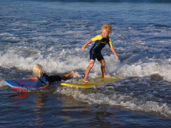 Robinson and Sienna playing in the waves...